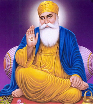 Guru Nanak Dev Ji Portrait in Yellow Robes and Turban with Blue Shawl HD phone wallpaper
