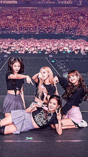 Blackpink Members Posing Together on Stage During World Tour Concert HD phone wallpaper