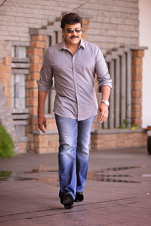 Chiranjeevi Walking in Grey Shirt and Blue Jeans with Sunglasses HD phone wallpaper