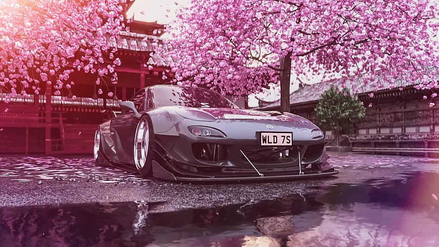 Widebody Mazda RX-7 Stanced Under Cherry Blossoms at a Japanese Temple HD wallpaper