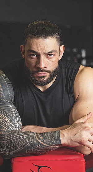 Roman Reigns Intense Portrait in Black Tank Top with Tribal Arm Tattoos, Roman Reigns Backgrounds HD phone wallpaper