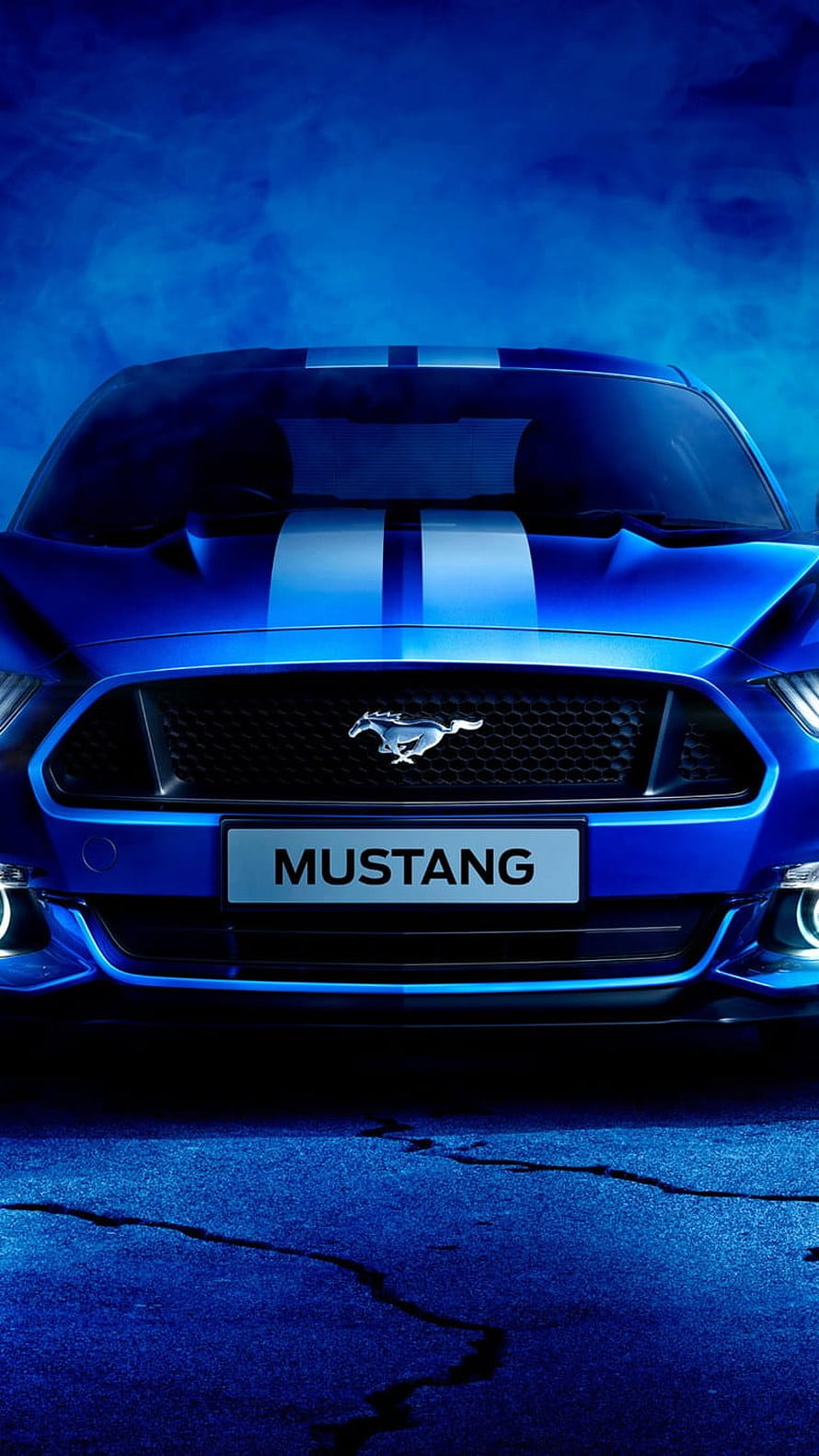 Front View of a Blue Ford Mustang with Racing Stripes in Dramatic Blue Lighting HD phone wallpaper
