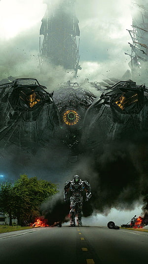 Massive Sci-Fi Robot Tower Looms Over Soldier Mech on Destroyed Road HD phone wallpaper