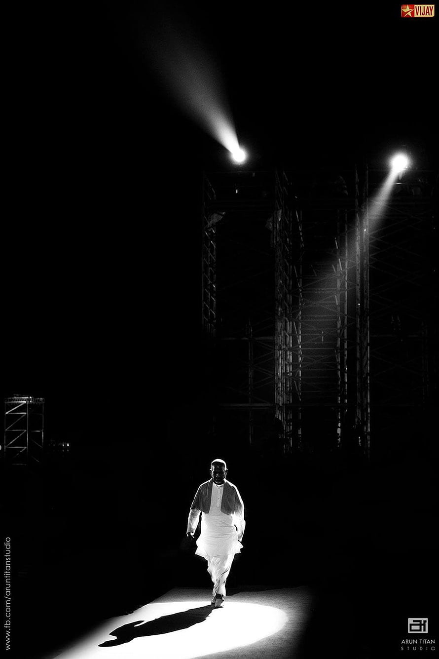 Narendra Modi Walking Under Spotlight in Dramatic Black and White Portrait HD phone wallpaper
