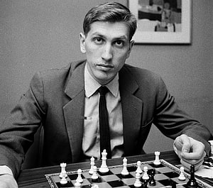 Bobby Fischer Seated at Chess Board in Formal Suit Black and White Portrait HD wallpaper