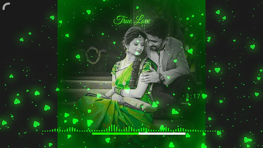 Romantic Indian couple in traditional attire with green heart overlay and music player interface HD wallpaper
