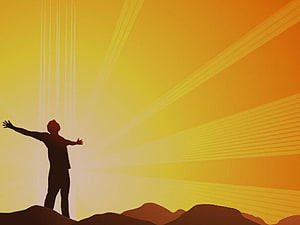 Silhouette of a person with outstretched arms against a radiant golden sunrise sky HD wallpaper