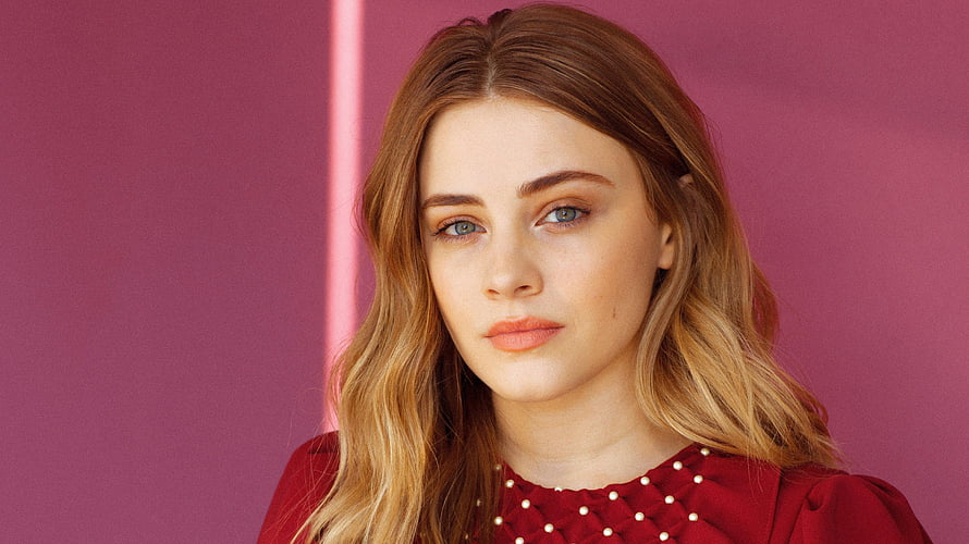 Josephine Langford Portrait in Red Beaded Top Against Pink Background HD wallpaper