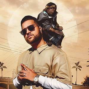 Bad Bunny with Monkey on Shoulder in Tan Shirt and Sunglasses HD phone wallpaper