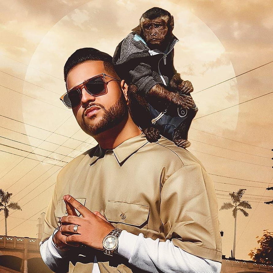 Bad Bunny with Monkey on Shoulder in Tan Shirt and Sunglasses HD phone wallpaper