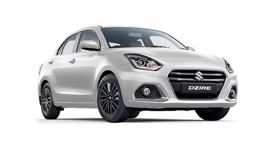 Silver Maruti Suzuki Dzire Sedan Front Three-Quarter View on White Background HD wallpaper