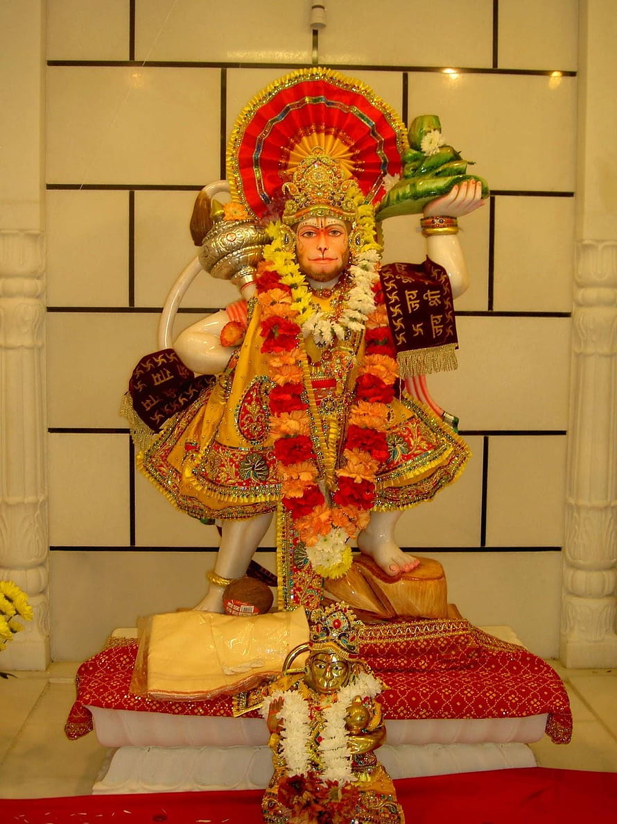 Vibrant Hanuman Statue Decorated with Flower Garlands and Traditional Attire, Hanuman Ji Source, hanuman ji full mobile HD phone wallpaper