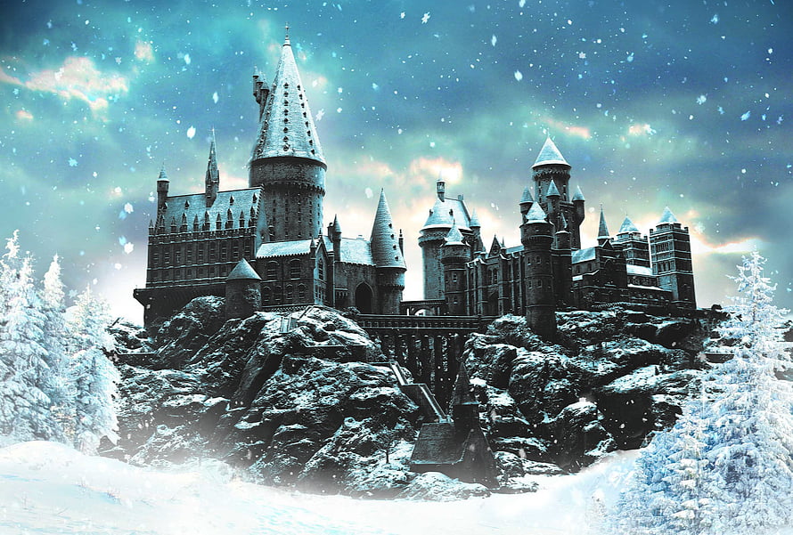 Hogwarts Castle in Winter Snowfall with Aurora Sky and Frozen Forest HD wallpaper