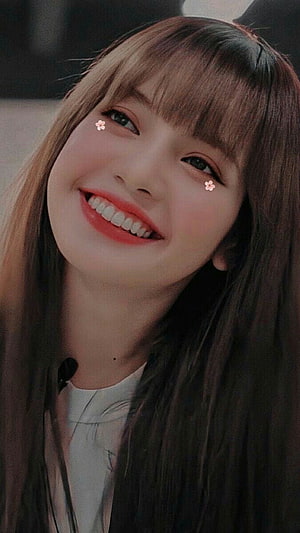 Lisa from BLACKPINK smiling portrait with cherry blossom accents and long brown hair HD phone wallpaper