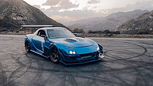 Blue Mazda RX-8 Widebody Drift Car on Mountain Road with Skid Marks HD wallpaper