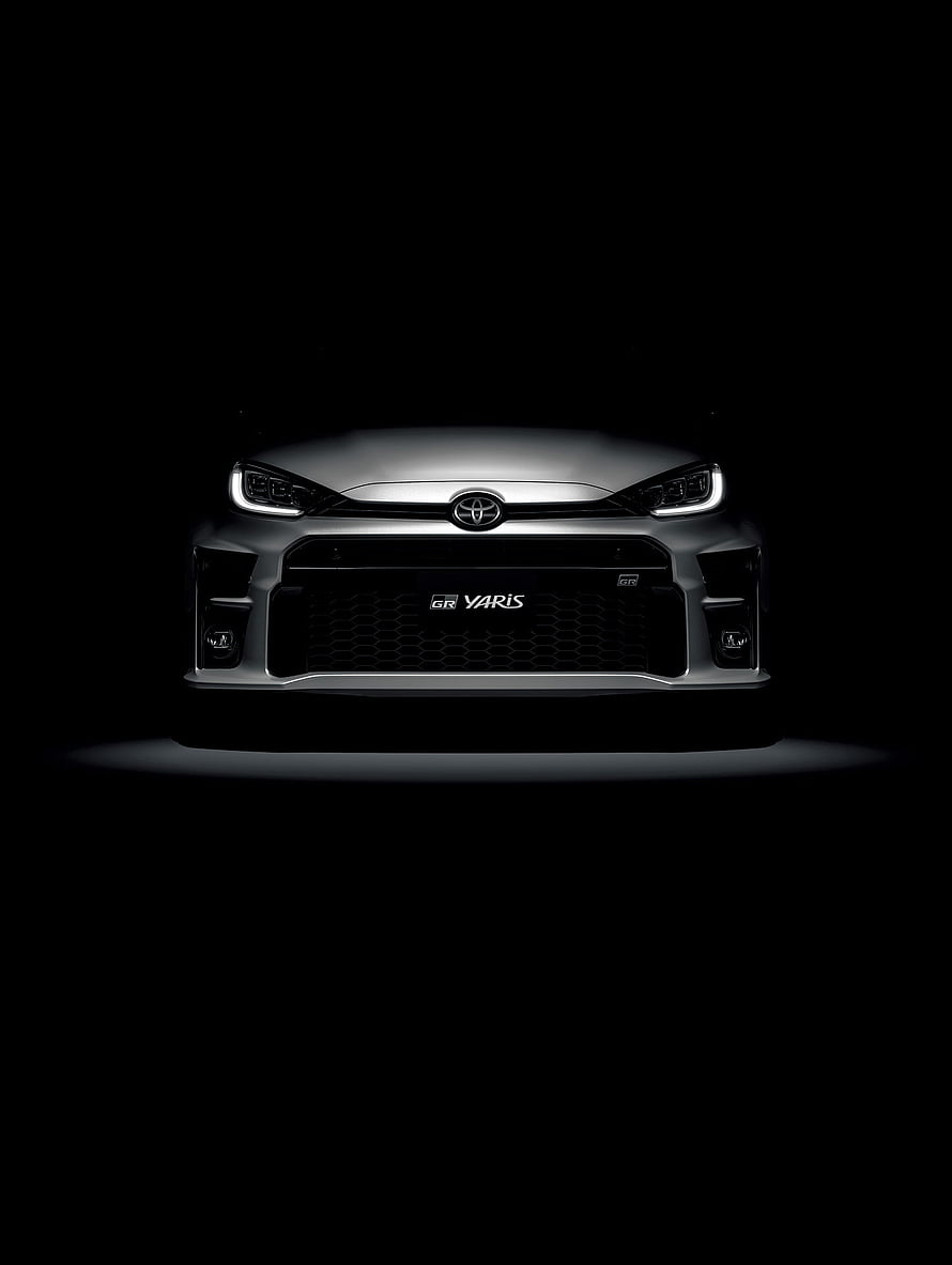 Toyota GR Yaris Front Fascia with LED Headlights in Dramatic Black Studio Lighting HD phone wallpaper