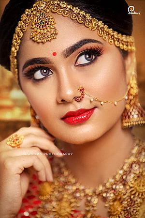 South Indian Bridal Portrait With Gold Jewelry And Traditional Makeup HD phone wallpaper
