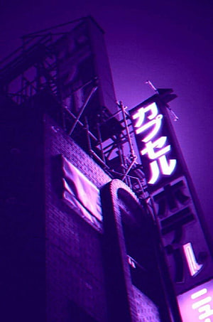 Neon Japanese Signage on Brick Building at Night with Purple and Pink Lighting HD phone wallpaper
