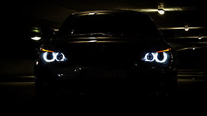 Dark BMW E90 with Angel Eyes Headlights in Underground Parking Garage HD wallpaper