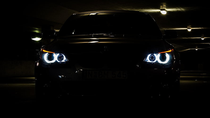 Dark BMW E90 with Angel Eyes Headlights in Underground Parking Garage HD wallpaper