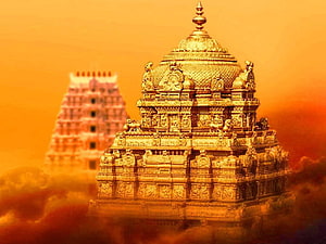 Tirupati Temple Golden Shrine Against Warm Orange Sky With Distant Gopuram HD wallpaper