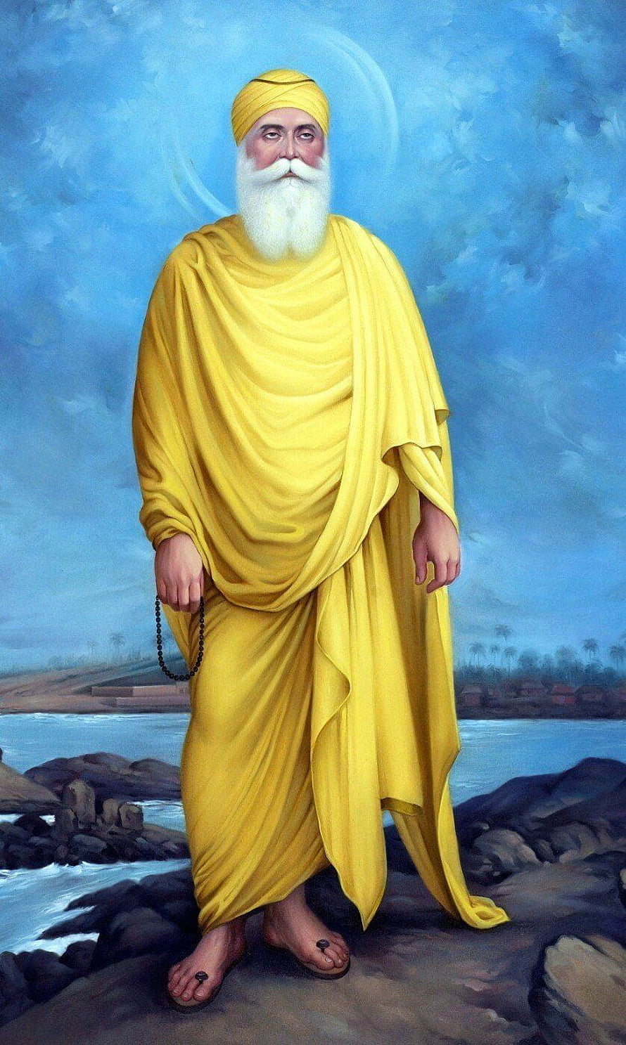 Portrait of Sai Baba in Yellow Robes Standing on Rocks by the Sea HD phone wallpaper