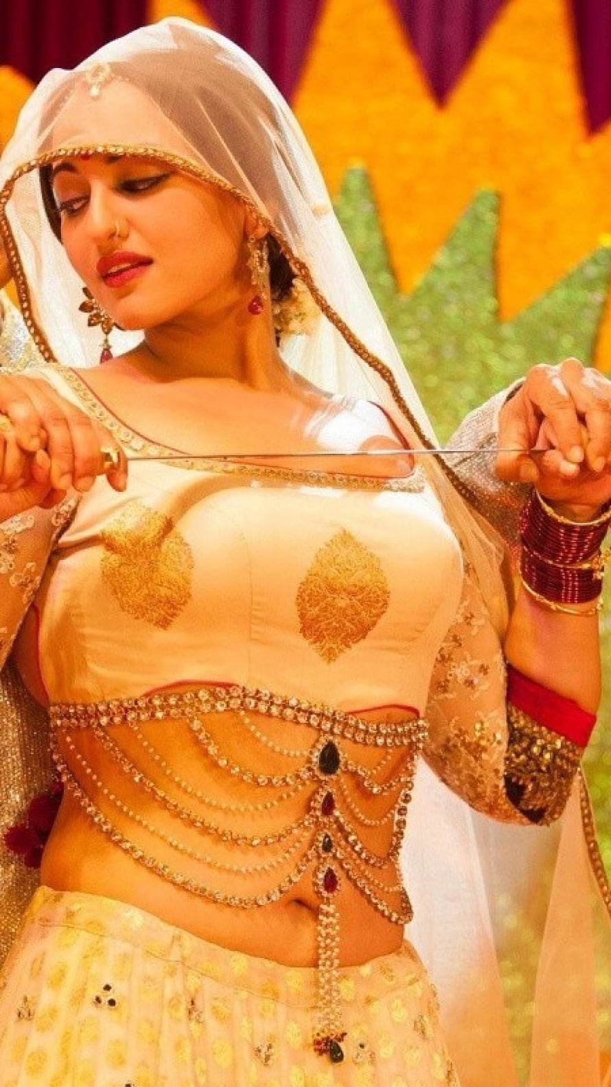 Sonakshi Sinha in Traditional Indian Bridal Attire with Gold Jewelry and Veil HD phone wallpaper