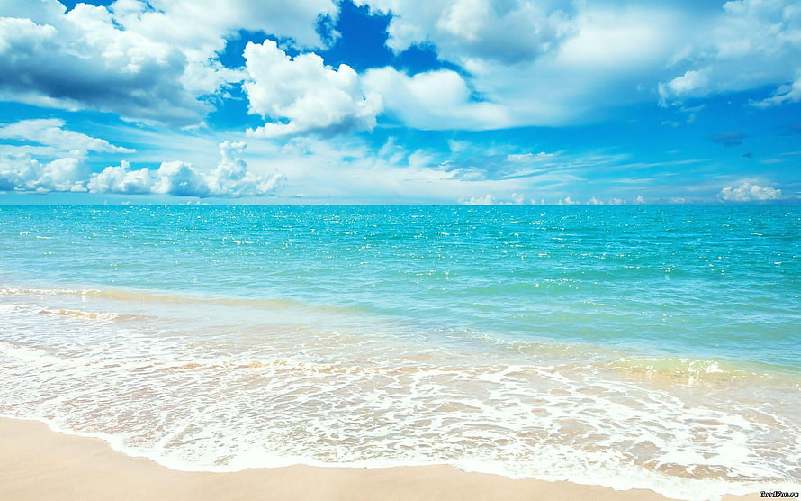 Serene Tropical Beach With Turquoise Ocean Waves And Fluffy White Clouds HD wallpaper
