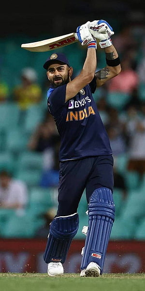 Virat Kohli in India ODI Jersey Executing a Powerful Cricket Shot HD phone wallpaper
