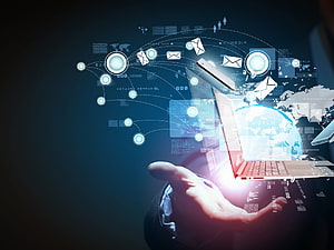 Hand Holding Laptop with Global Network and Digital Connectivity Visualization HD wallpaper
