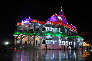 Ghoom Kshetra Temple illuminated with colorful lights at night in Puri, Odisha HD wallpaper