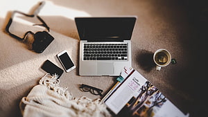 Cozy Workspace Flat Lay With MacBook, Smartphone, Camera, Coffee, and Knit Blanket HD wallpaper