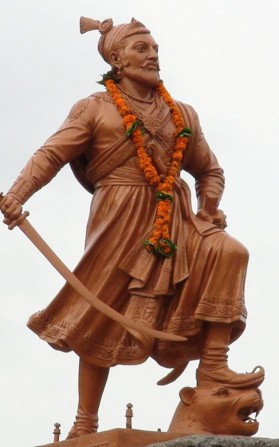Bronze Statue of Chhatrapati Shivaji Maharaj Holding a Sword and Standing on a Tiger HD phone wallpaper