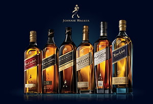 Johnnie Walker Scotch Whisky Collection Featuring Red, Black, Double Black, Gold, Platinum, and Blue Label Bottles HD wallpaper