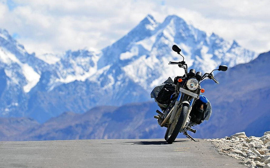 Leh Ladakh Motorcycle Adventure on Snow-Capped Himalayan Mountain Road HD wallpaper