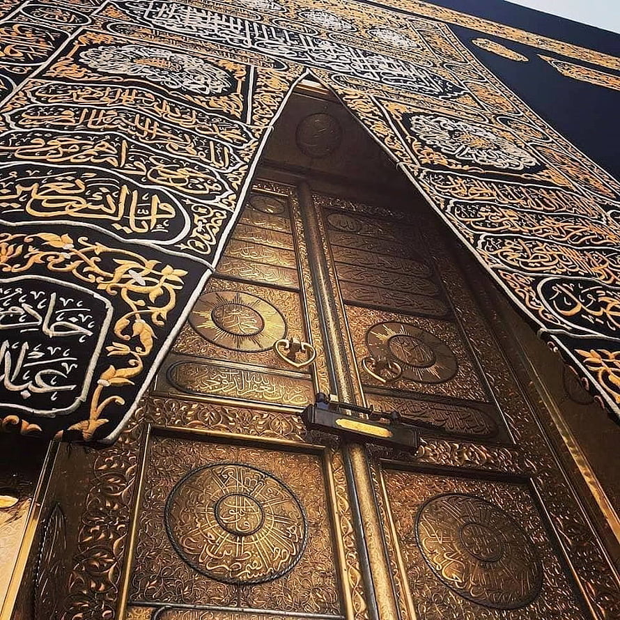 Ornate Golden Kaaba Door with Intricate Arabic Calligraphy and Islamic Geometric Patterns HD phone wallpaper
