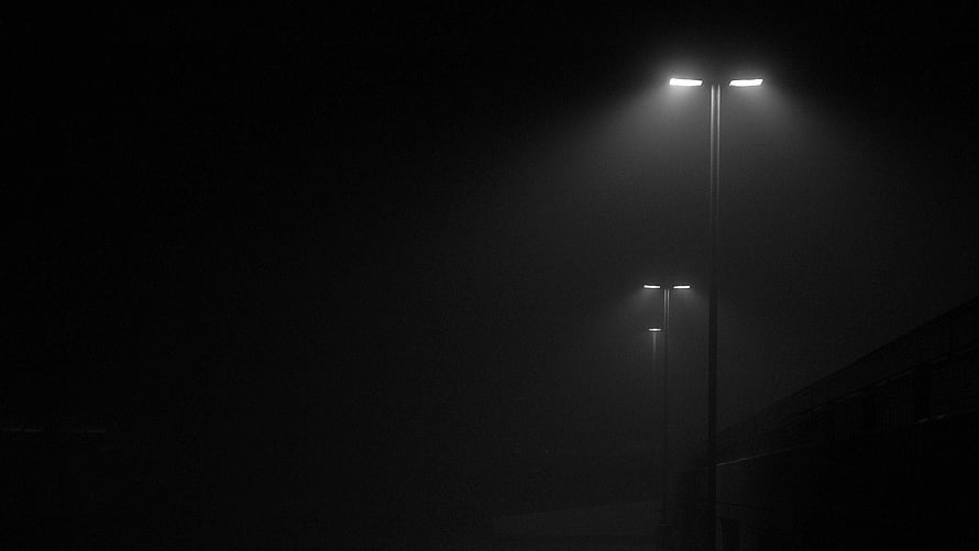 Moody Night Street Scene With Glowing Streetlights In Thick Fog HD wallpaper