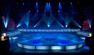 Empty Concert Stage With Blue Spotlights And Starry Backdrop HD wallpaper