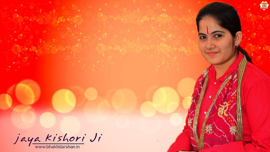 Jaya Kishori Ji in Traditional Red Attire with Festive Bokeh Background HD wallpaper