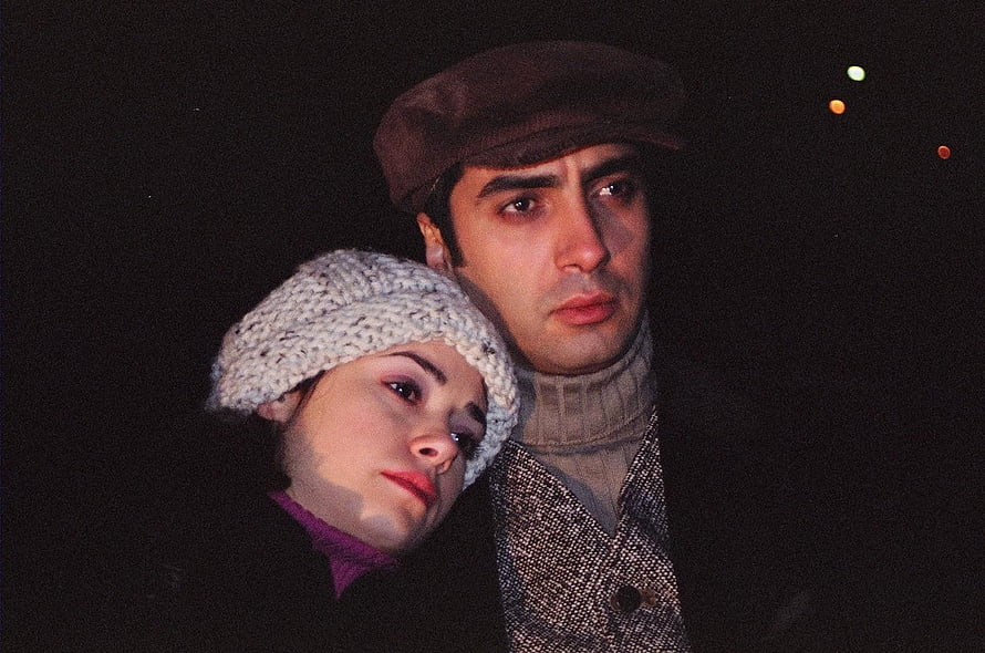 Kurtlar Vadisi Dramatic Couple Portrait in Winter Attire HD wallpaper