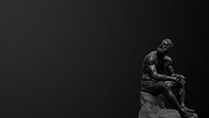 Dark moody bronze statue of a seated bearded man on a rock against a black background, : statue, dark, Ancient Greek sculpture 1920x1080, #greek sculpture HD wallpaper
