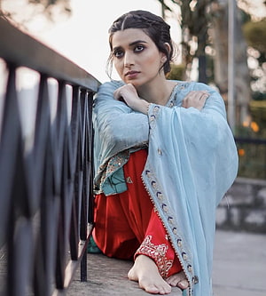 Nimrat Khaira in Traditional Pakistani Attire Leaning on Balcony Railing HD phone wallpaper
