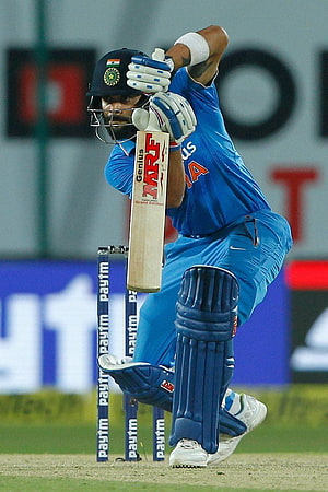 Virat Kohli Executing a Cover Drive in Indian Cricket Team Blue Kit HD phone wallpaper