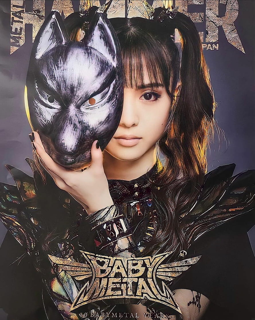 Moa Kikuchi of BABYMETAL holding a metallic wolf mask in dark gothic stage costume HD phone wallpaper