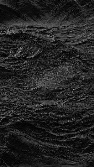 Dark Ocean Waves Texture with Deep Black Water Surface and Rugged Sea Patterns HD phone wallpaper