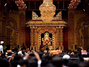 Dagdusheth Ganpati Temple Interior During Ganesh Chaturthi Festival with Devotees HD wallpaper