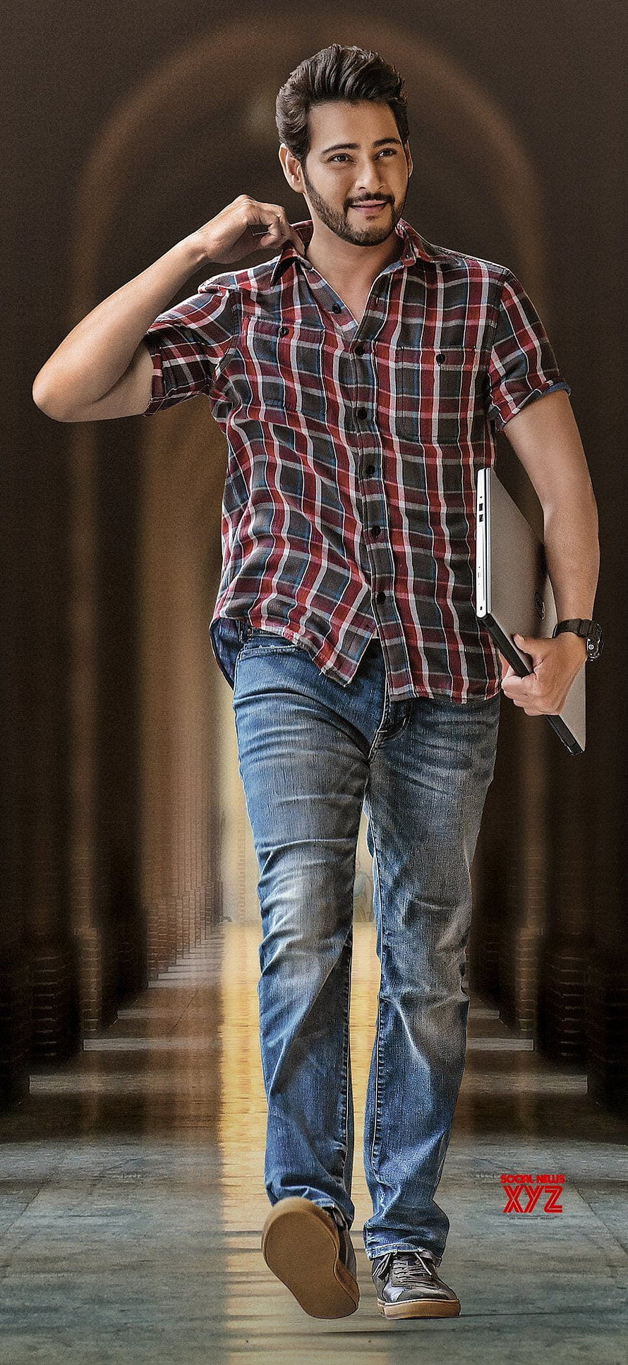 Mahesh Babu Walking in Plaid Shirt and Jeans Holding Laptop HD phone wallpaper