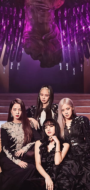 Blackpink in dramatic black couture under a purple crystal chandelier HD phone wallpaper