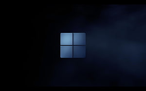 Windows 11 Blue Logo on Dark Background HD wallpaper