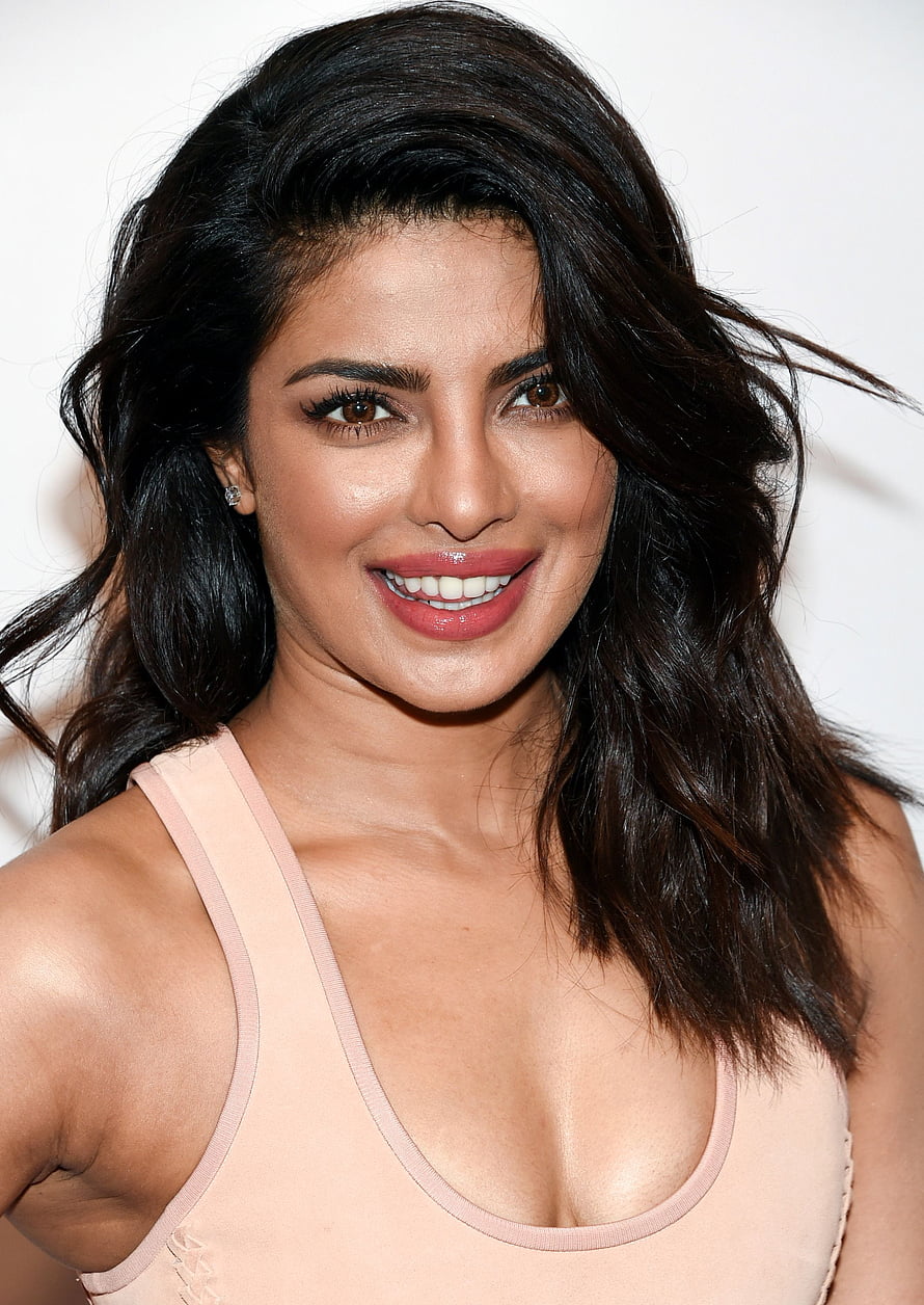 Priyanka Chopra smiling portrait with dark wavy hair and nude tank top HD phone wallpaper
